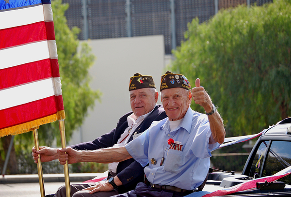 images_blog_2019_bigstock-Military-Veterans-Holding-Flag-25716107